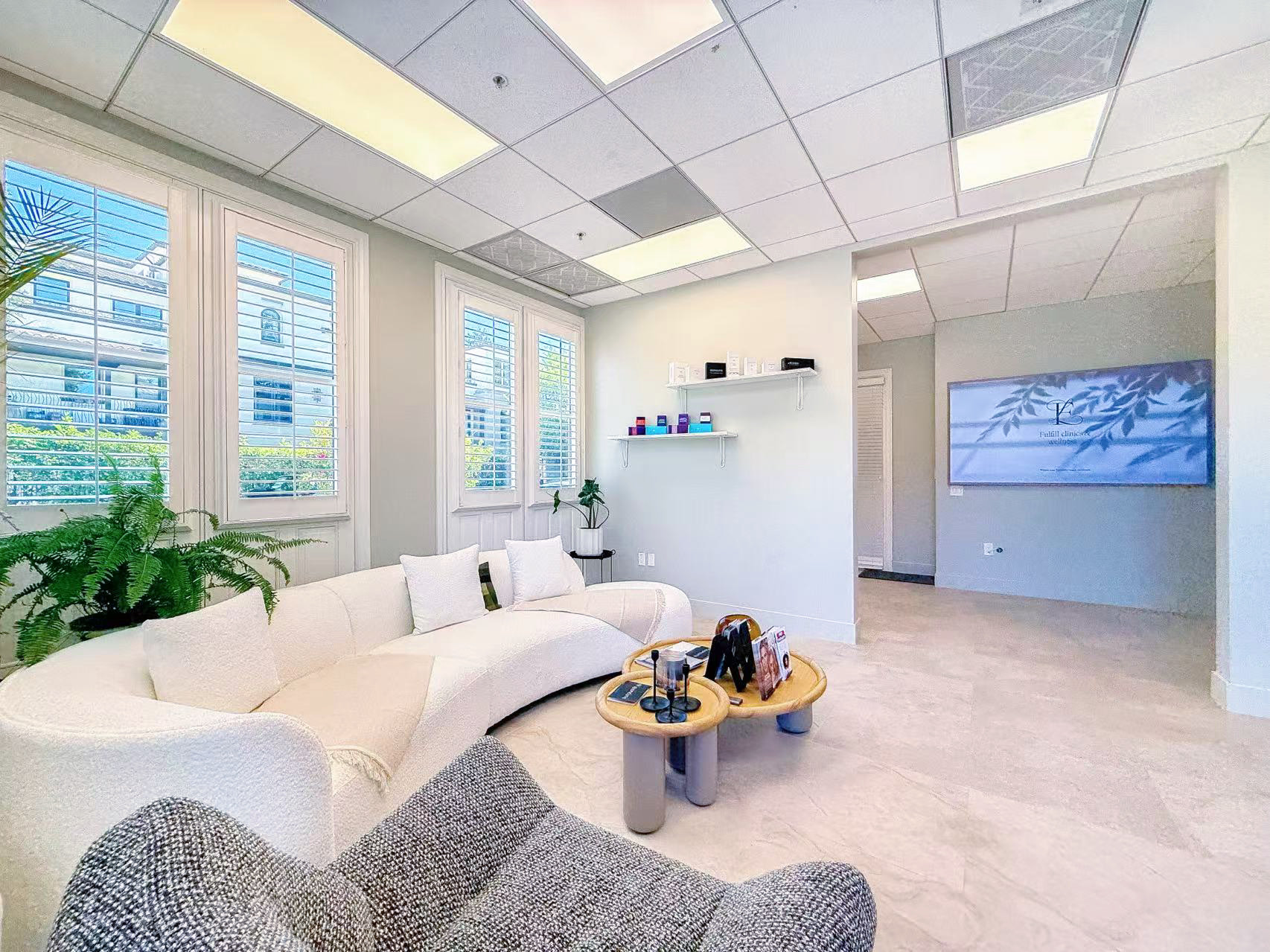 Los Altos clinic waiting area with sofa and Fulfill display
